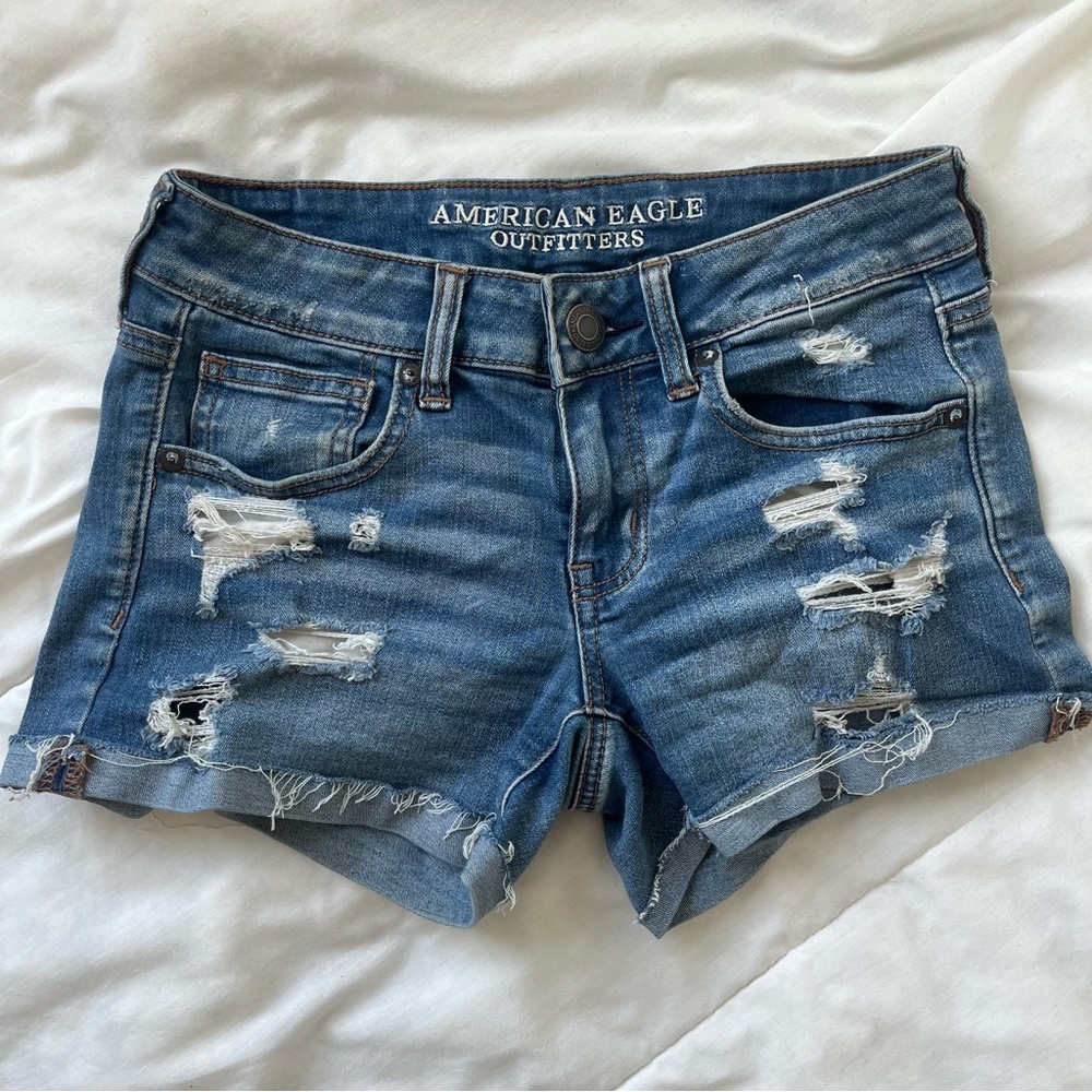 AMERICAN EAGLE SUPER LOW SHORTIE JEAN SHORTS